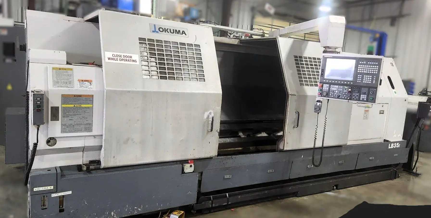 2010 Okuma LB-35II CNC Turning Center With Chip Conveyor, 40 HP, 3200 RPM - CNC LATHES