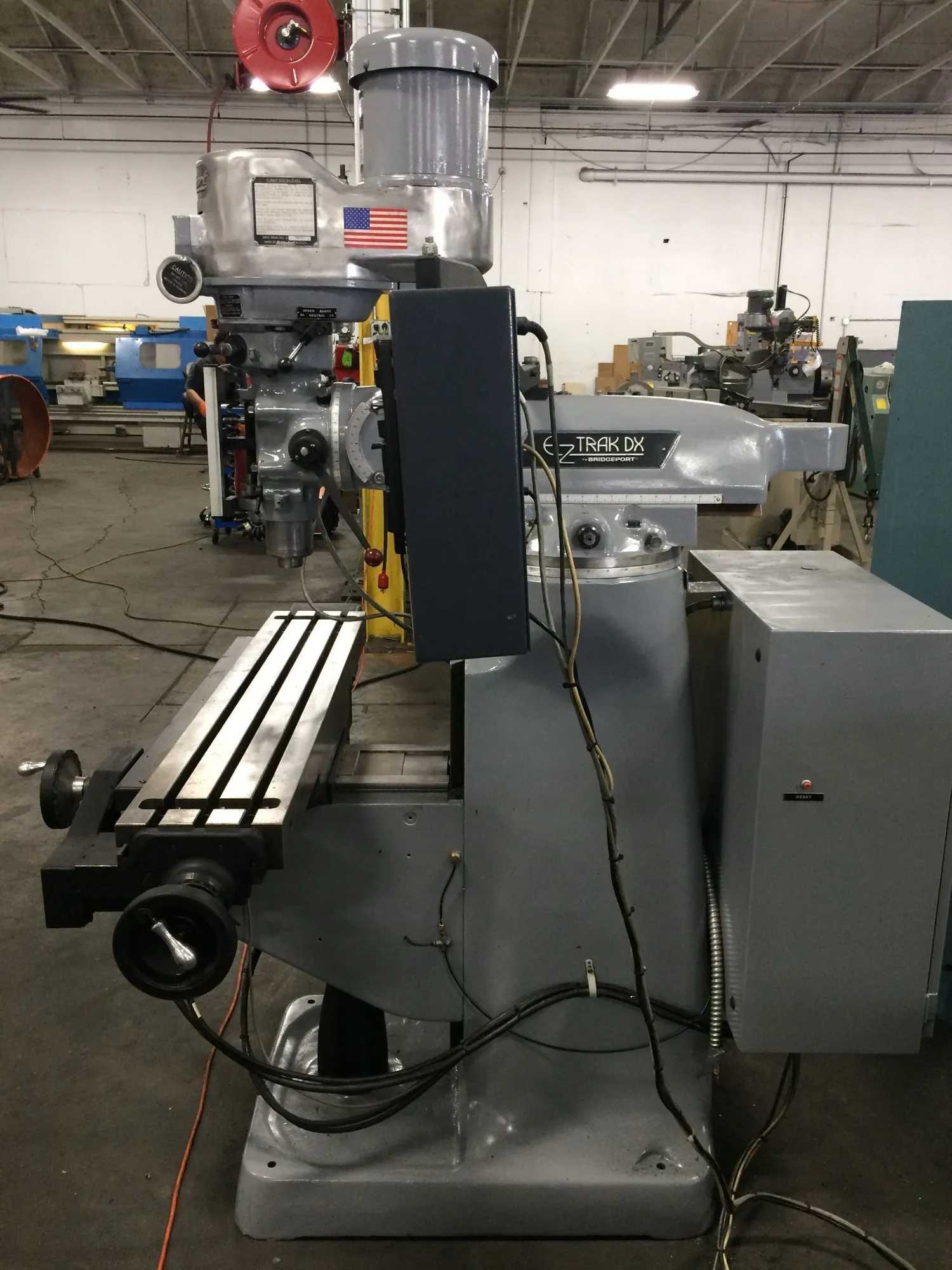BRIDGEPORT EZ TRAK DX VERTICAL MILL, 9" X 48" TABLE, 2 HP, 60-4200 RPM, R8, 230V - VERTICAL MILLING MACHINES