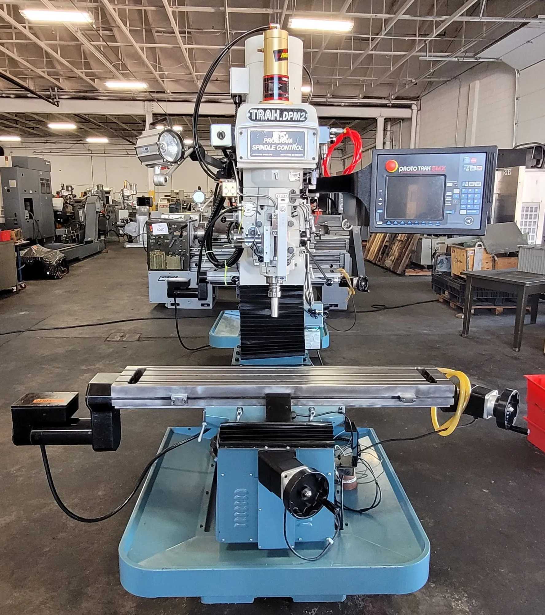2016 Southwestern Industries Trak DPM2 3 Axis CNC Bed Mill W/PDB - 49x9 Table, 5000 RPM, 3 HP - VERTICAL MILLING MACHINES