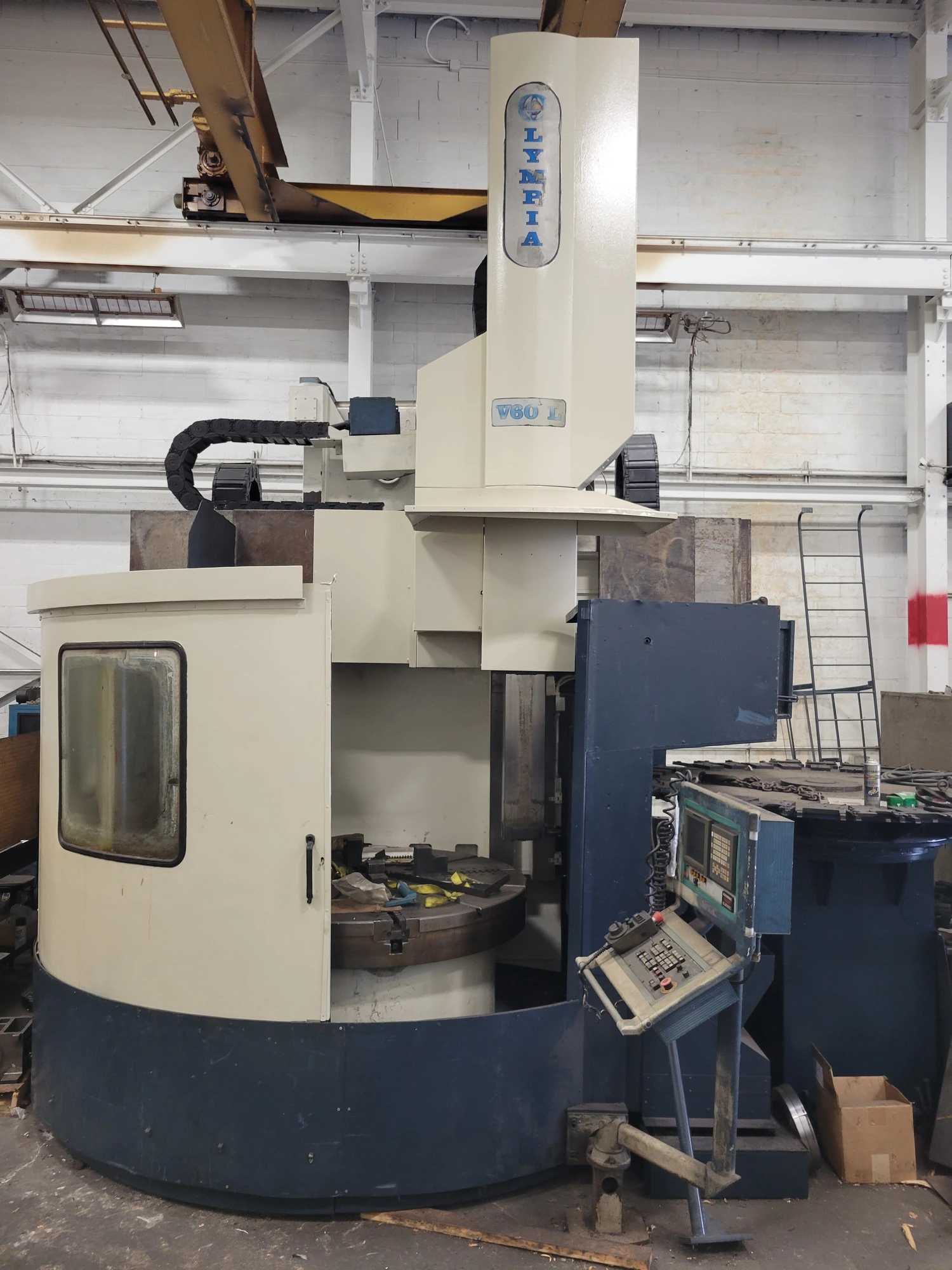 Olympia 70" CNC VTL, FANUC 180I-T, 50 HP, 350 RPM, 66" Table, Movable Column, 30 ATC - VERTICAL BORING MILLS