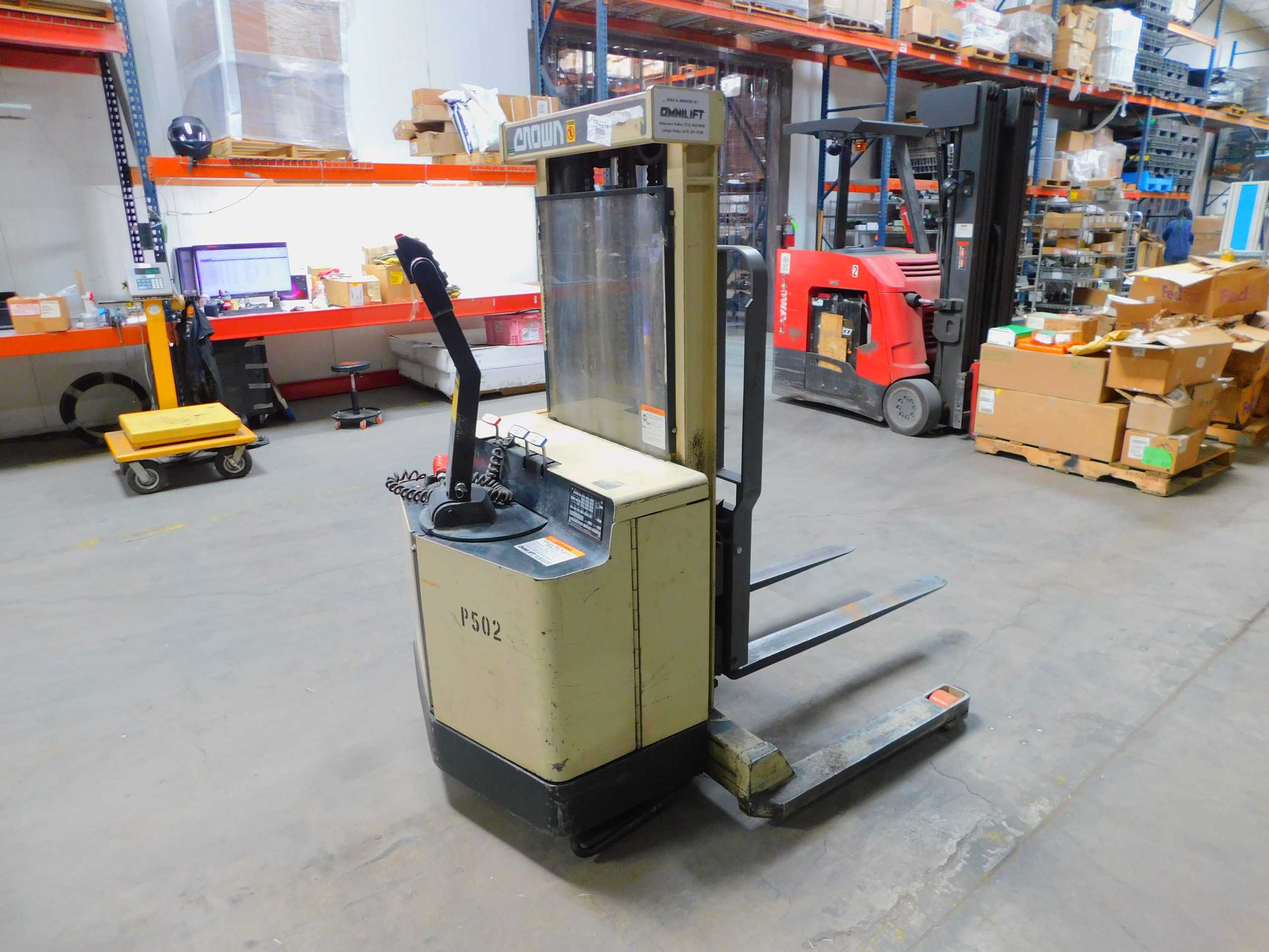 Crown 30WTL Electric Walk-Behind Straddle Stacker And Reach Forklift 2700 Lbs - FORKLIFTS
