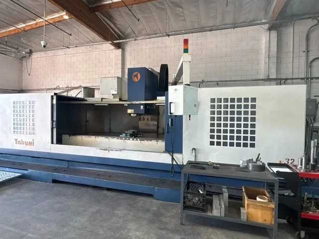 2007 Takumi V32 CNC Vertical Machining Center With FANUC Control & Rotary Table - VERTICAL MACHINING CENTERS