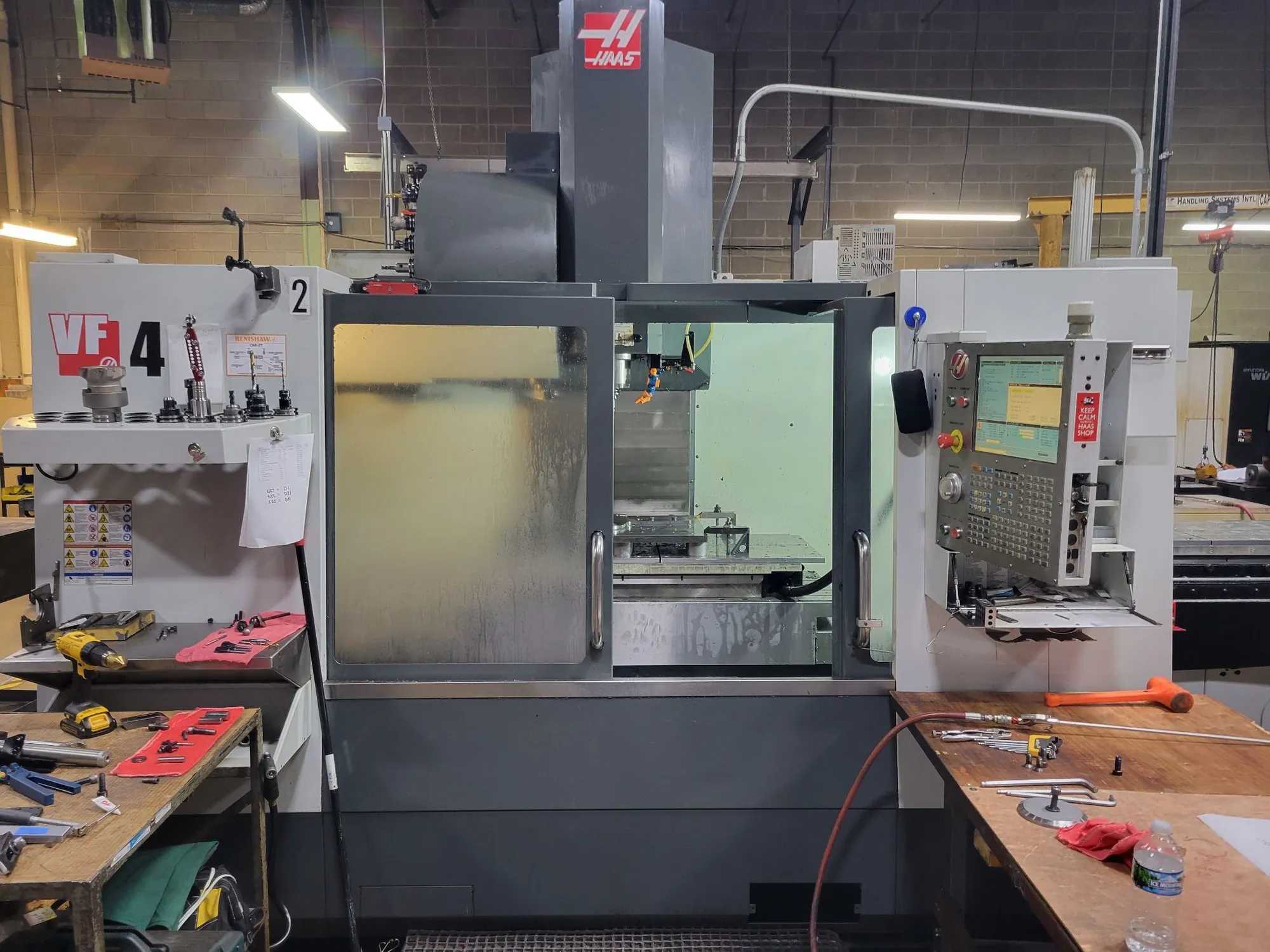Used 2012 Haas VF-4 Vertical Machining Center With Pallets, 30 HP, CNC Control - VERTICAL MACHINING CENTERS